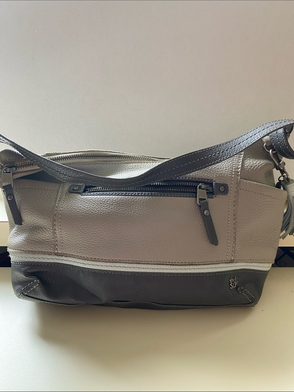 The Sak Taupe and Dark Gray Leather Crossbody